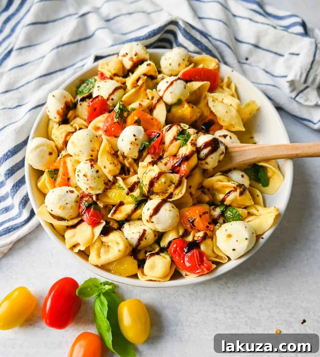 Sun-Kissed Caprese Tortellini 5 This Caprese Tortellini is made with cheese Tortellini tossed with sauteed garlic and tomatoes in extra virgin olive oil, fresh basil, and fresh mozzarella and spices. This fresh tortellini caprese pasta is perfect for summer!
