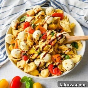Sun-Kissed Caprese Tortellini 7 This Caprese Tortellini is made with cheese Tortellini tossed with sauteed garlic and tomatoes in extra virgin olive oil, fresh basil, and fresh mozzarella and spices. This fresh tortellini caprese pasta is perfect for summer!