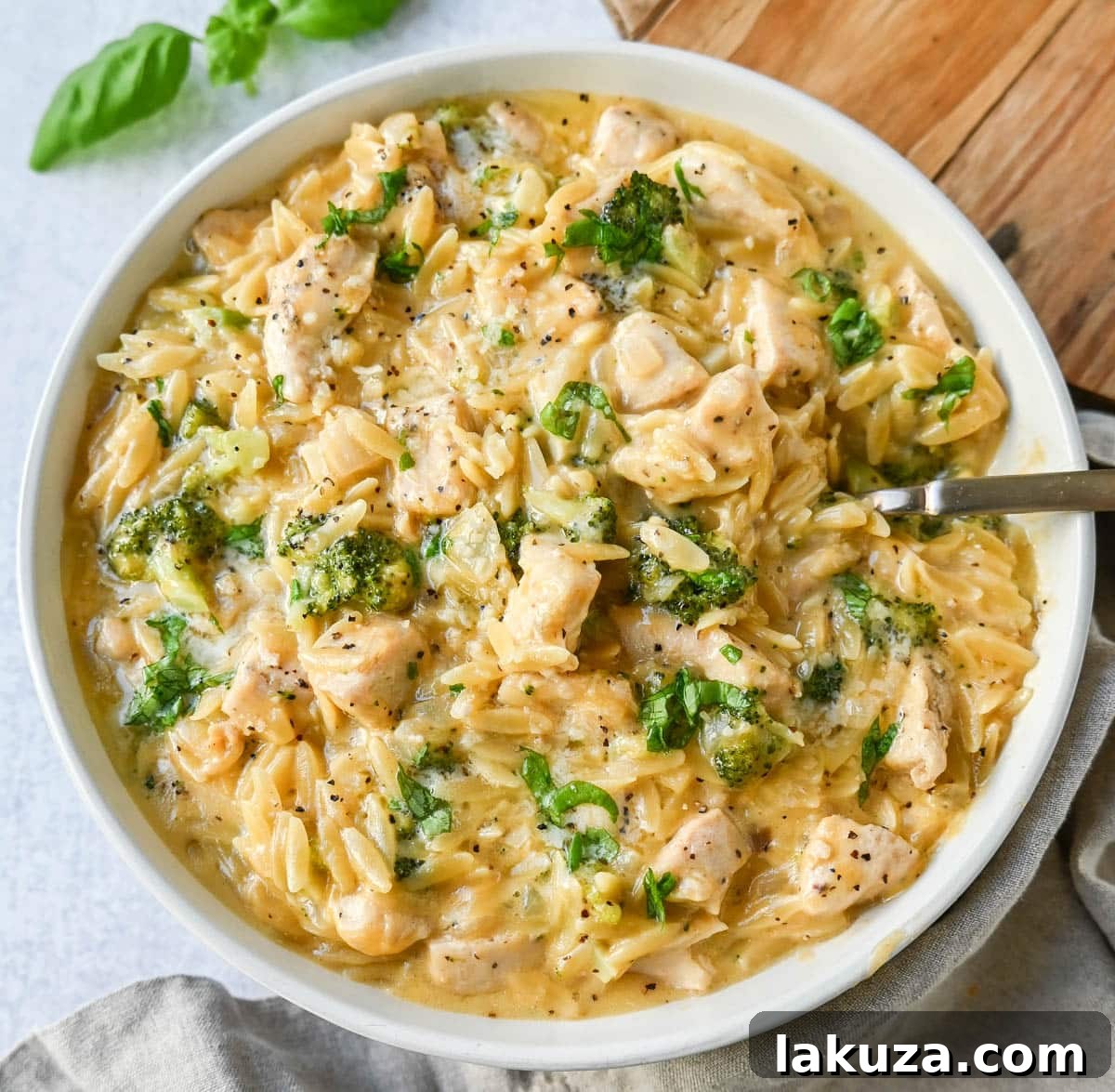 Creamy Chicken and Broccoli Orzo Bake 2 Creamy Chicken Broccoli Orzo made with sauteed chicken, fresh broccoli, orzo pasta in a cheesy sauce. This easy Cheesy Chicken Broccoli Orzo Skillet 30-minute meal is creamy and delicious!