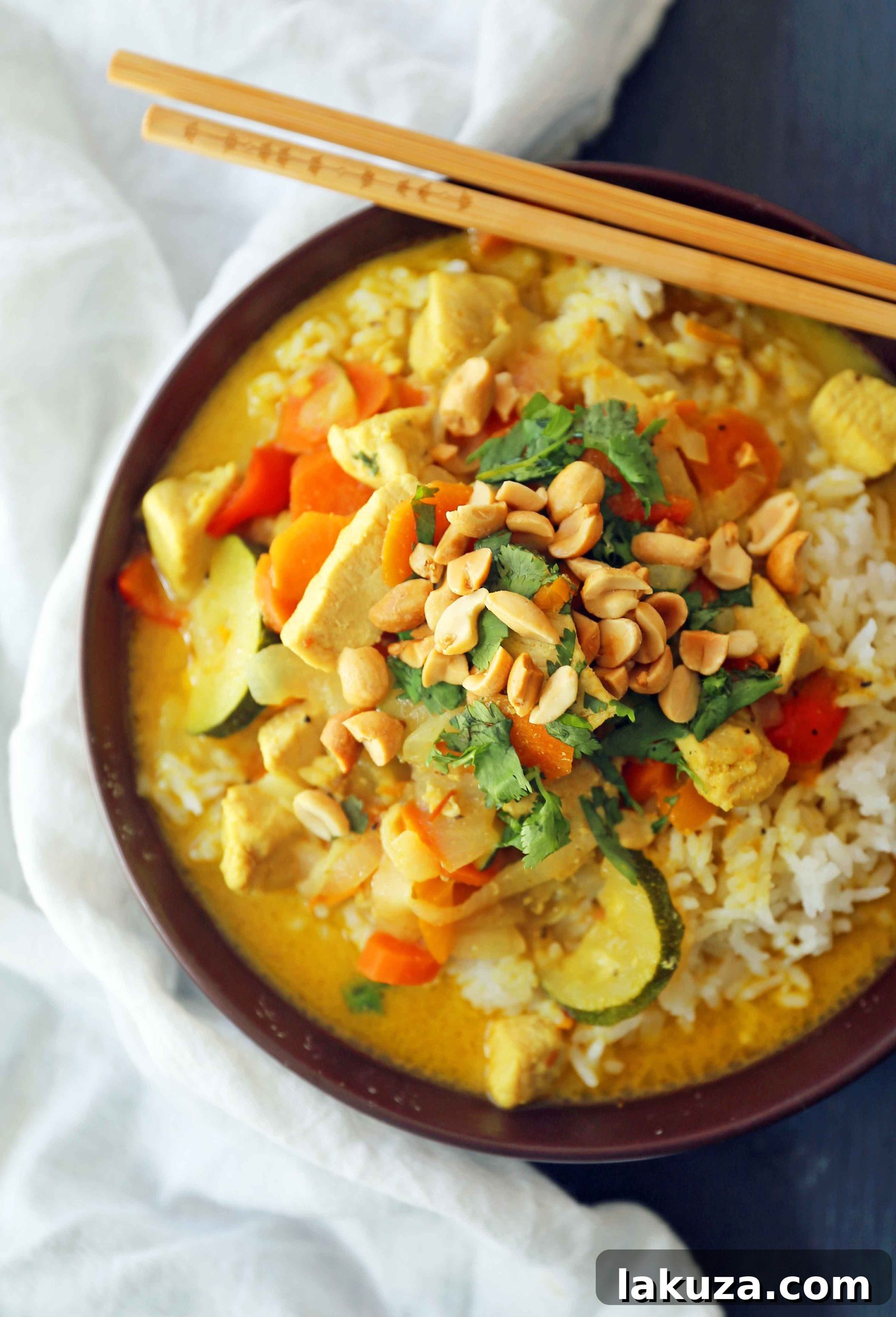 Golden Thai Chicken Curry Bowls 2 Rich and aromatic Thai Green Chicken Curry with vibrant vegetables. A healthy, gluten-free, and dairy-free weeknight dinner recipe, featuring tender chicken in a creamy coconut broth. Perfect for a quick, flavorful meal.