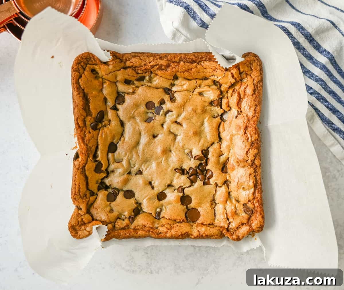 The Best Chocolate Chip Blondies Recipe Ever! How to make chewy, soft blondies from scratch. This is the most delicious and easiest chocolate chip blondie recipe.