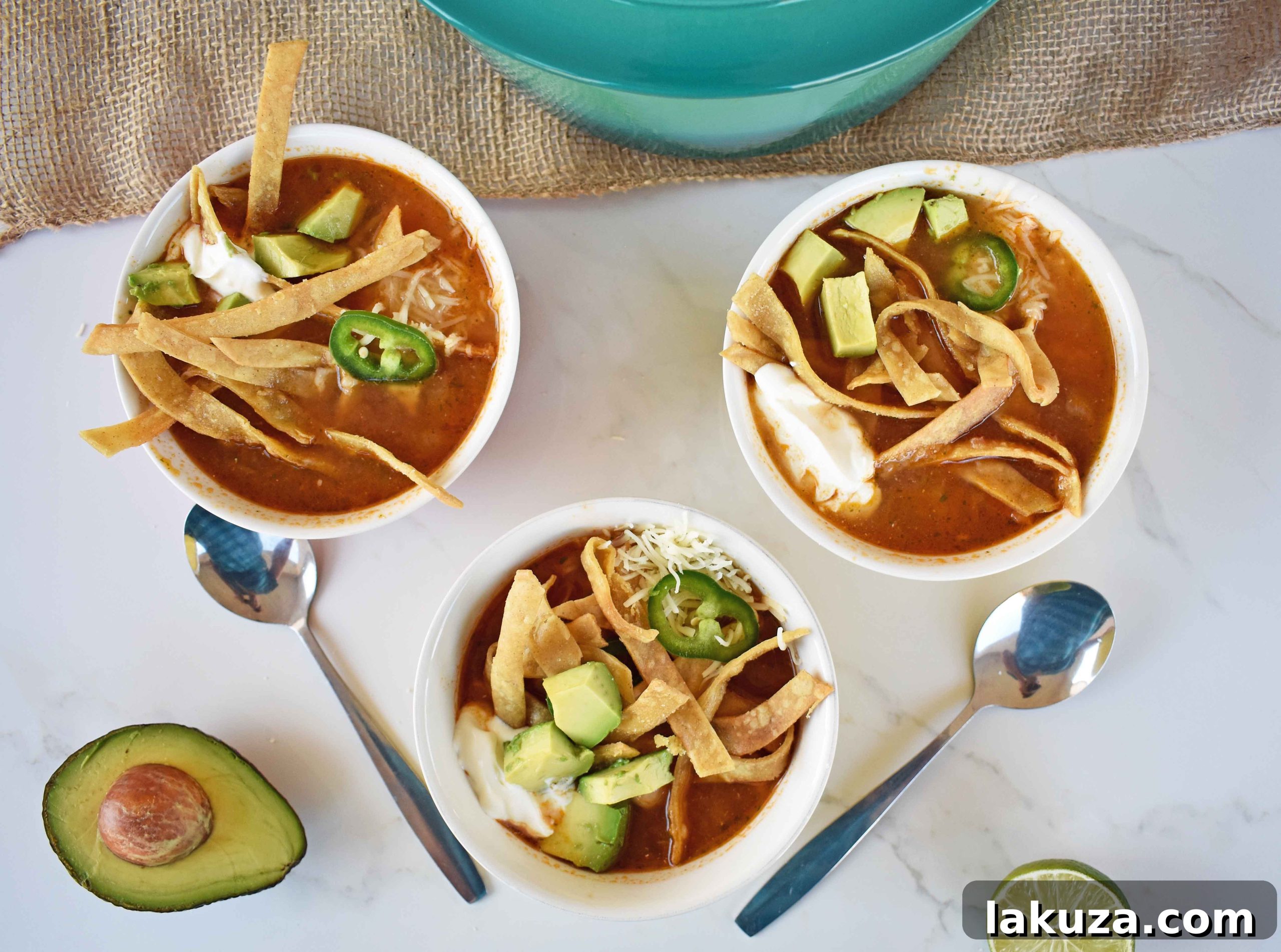 Hearty Chicken Tortilla Soup 10 A vibrant bowl of homemade Chicken Tortilla Soup, generously topped and ready to be savored, perfect for sharing with family and friends.