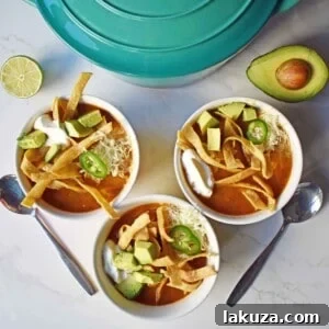 Chicken Tortilla Soup by Modern Honey. The perfect chicken tortilla soup made from scratch.