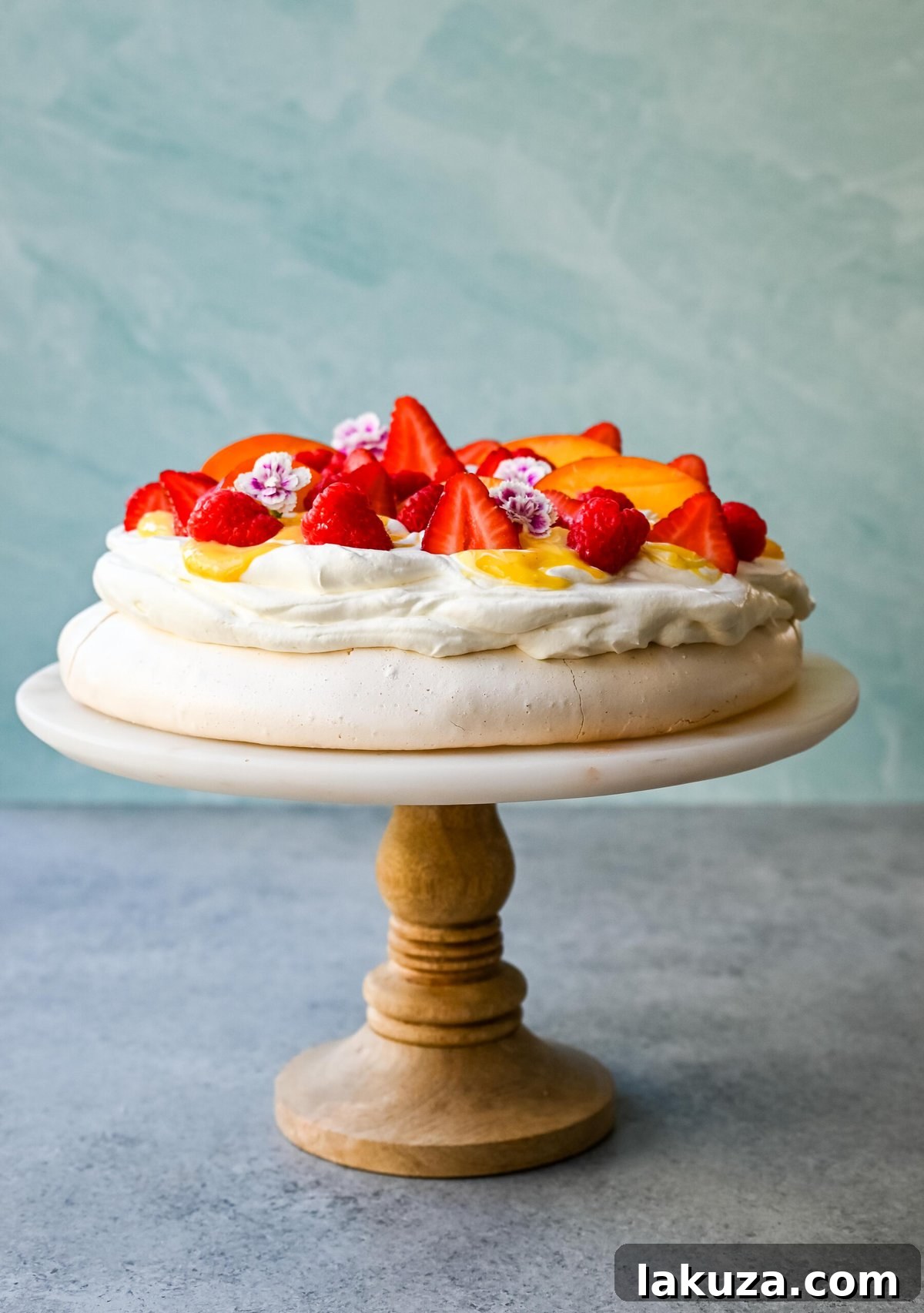Another view of a beautiful Pavlova, highlighting its crispy yet soft texture.