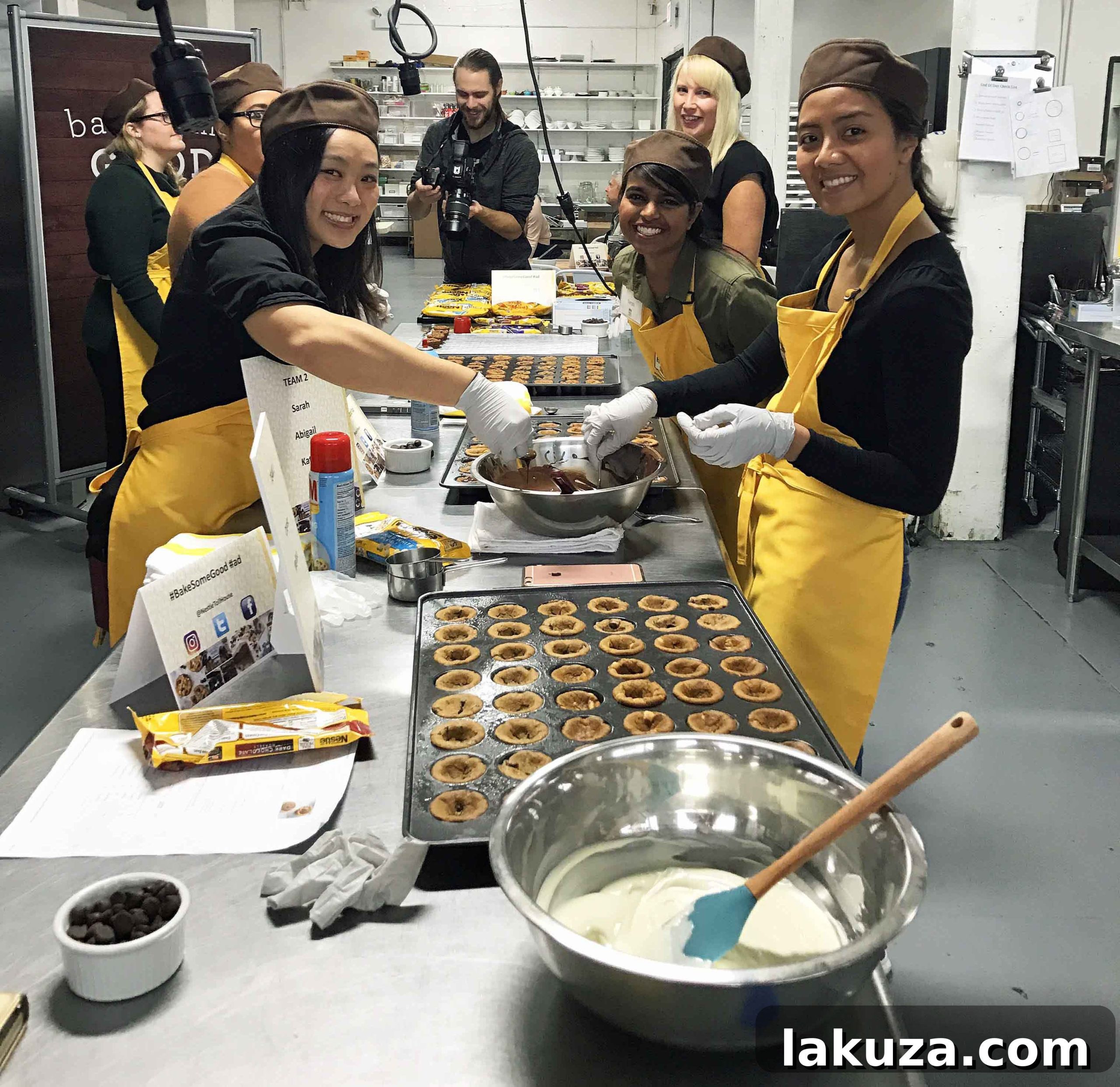 Trays of freshly baked cookie cups, cooled and ready for their ganache filling and delivery, showcasing the effort behind the Nestle Bake Some Good initiative.