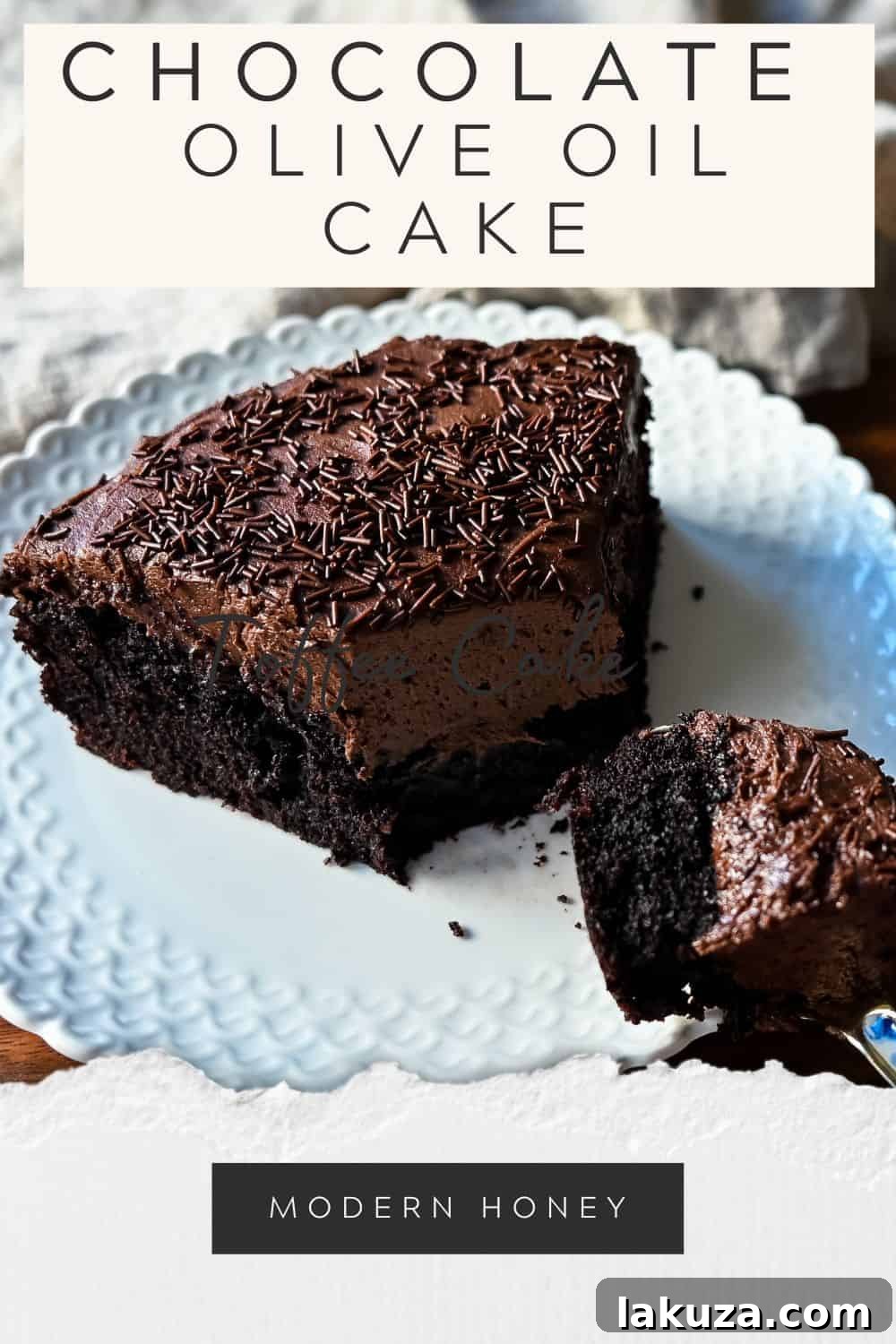 Another enticing view of the Chocolate Olive Oil Cake with chocolate frosting, ready to be served.