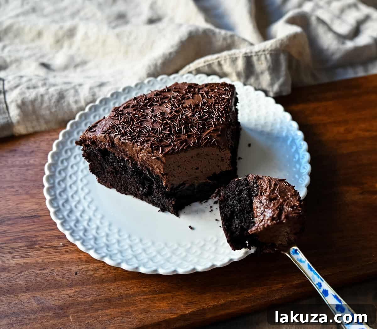 A beautifully decorated Chocolate Olive Oil Cake, ready for serving.