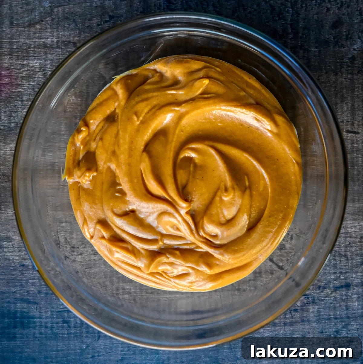 Sweet potato pie filling blending in a food processor for a perfectly smooth consistency.