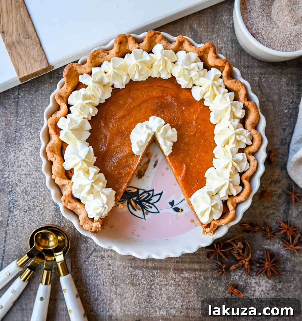 A whole Southern Sweet Potato Pie, freshly baked and cooling, with a perfectly golden crust and smooth filling.