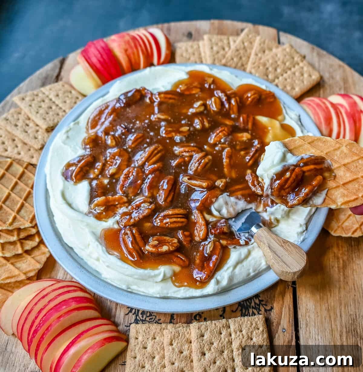 No Bake Pecan Pie Dip. This Pecan Pie Dip is made with creamy, fluffy, sweet cream cheese and whipped cream topped with a homemade pecan caramel sauce. This is all of the flavors of pecan pie without all of the work. A sweet and delicious holiday appetizer.