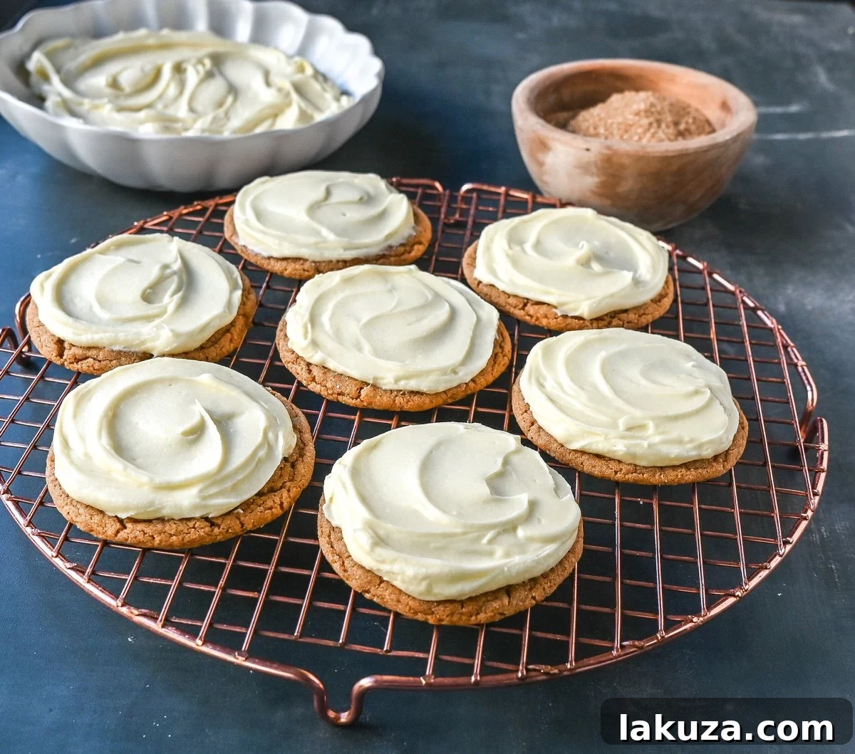 Soft Gingerbread Cookies with Cream Cheese Frosting. These Frosted Molasses Ginger Cookies are the perfect Christmas Cookie. Soft in the center with the perfect crisp edges. The sweet cream cheese frosting pairs perfectly with the spiced gingerbread cookie. This is a quintessential Christmas cookie recipe that gets rave reviews!