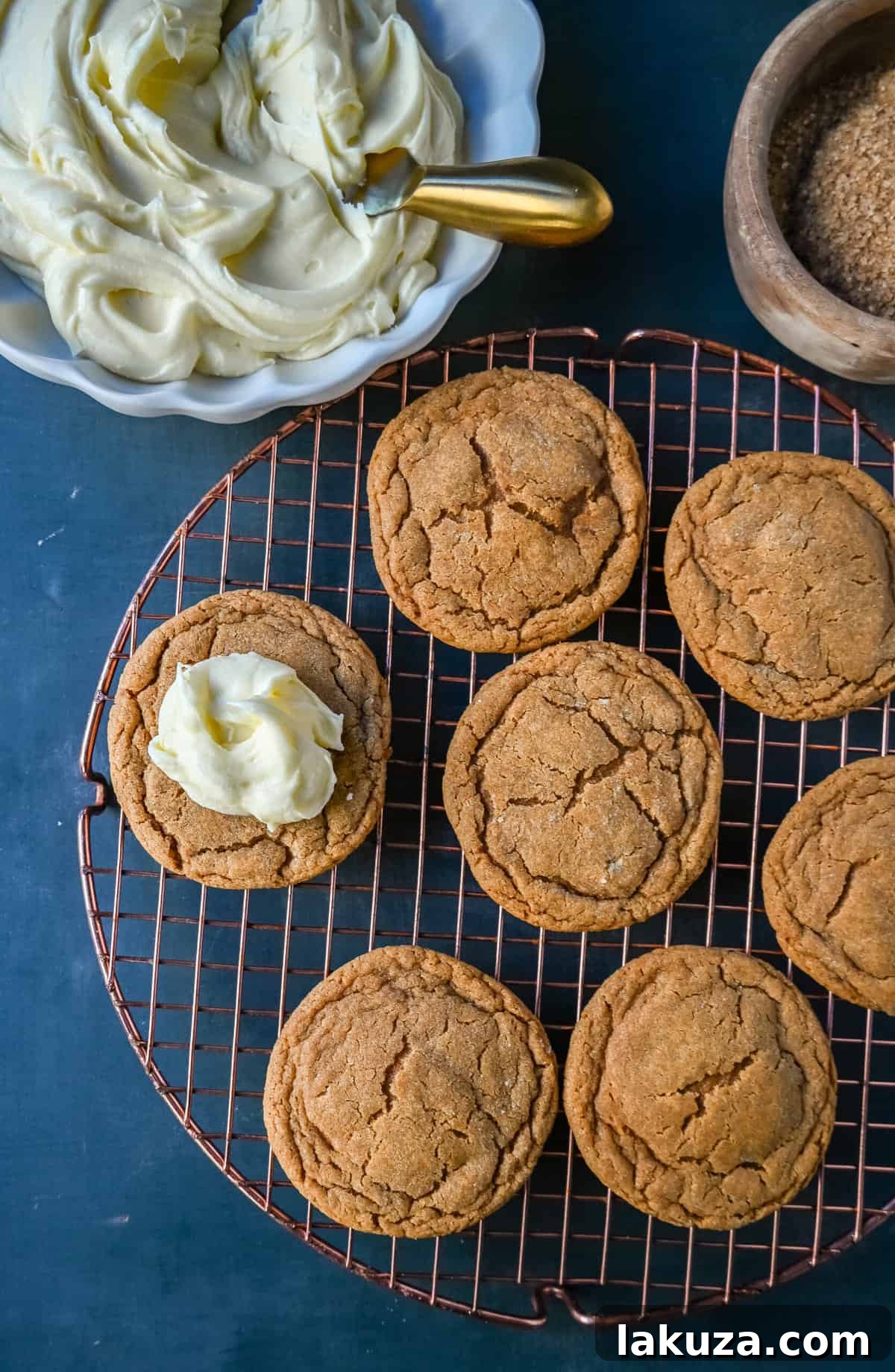 Soft Gingerbread Cookies with Cream Cheese Frosting. These Frosted Molasses Ginger Cookies are the perfect Christmas Cookie. Soft in the center with the perfect crisp edges. The sweet cream cheese frosting pairs perfectly with the spiced gingerbread cookie. This is a quintessential Christmas cookie recipe that gets rave reviews!