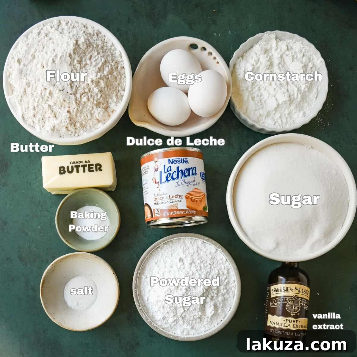 Arrangement of Alfajores ingredients on a white surface.