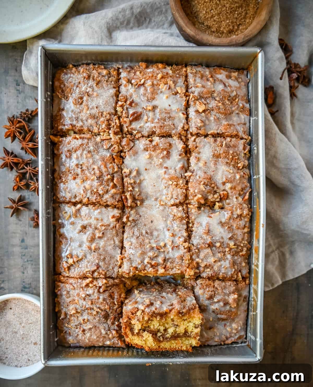 Best Coffee Cake Recipe. This cinnamon brown sugar sour cream coffee cake is made with a buttery cake layered with a brown sugar cinnamon layer and topped with a streusel topping and a sweet glaze. The best coffee cake recipe perfect for breakfast or brunch or Christmas morning breakfast.
