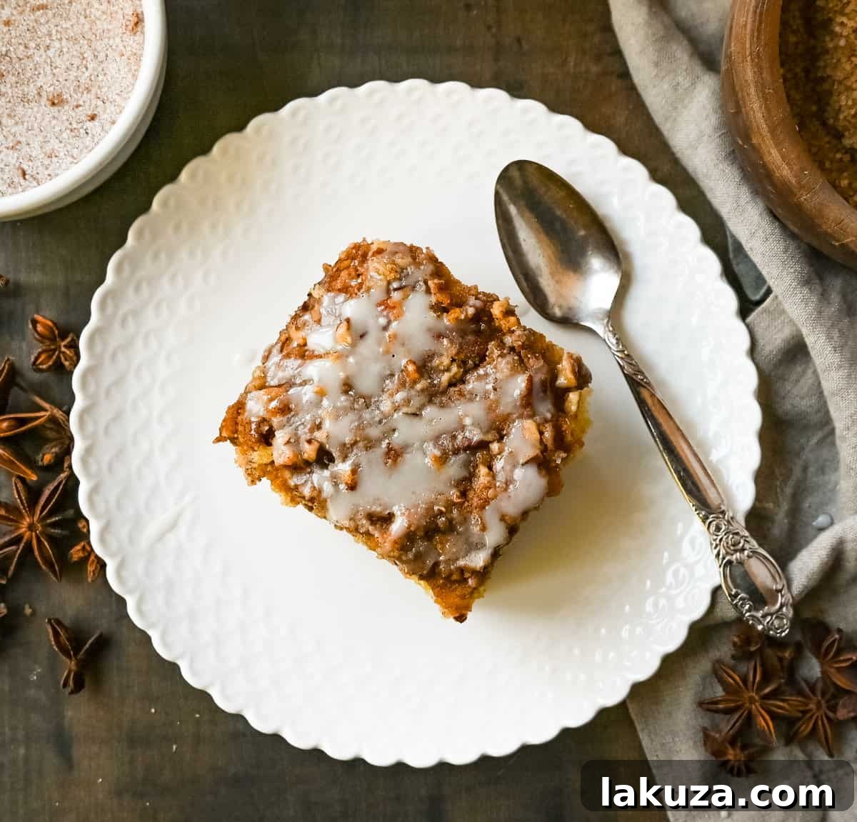 Best Coffee Cake Recipe. This cinnamon brown sugar sour cream coffee cake is made with a buttery cake layered with a brown sugar cinnamon layer and topped with a streusel topping and a sweet glaze. The best coffee cake recipe perfect for breakfast or brunch.