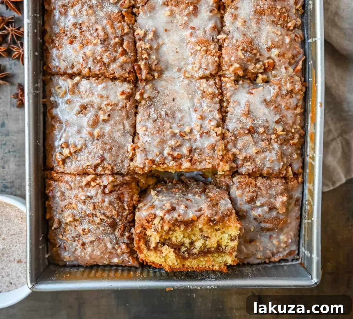 Best Coffee Cake Recipe. This cinnamon brown sugar sour cream coffee cake is made with a buttery cake layered with a brown sugar cinnamon layer and topped with a streusel topping and a sweet glaze. The best coffee cake recipe perfect for breakfast or brunch.