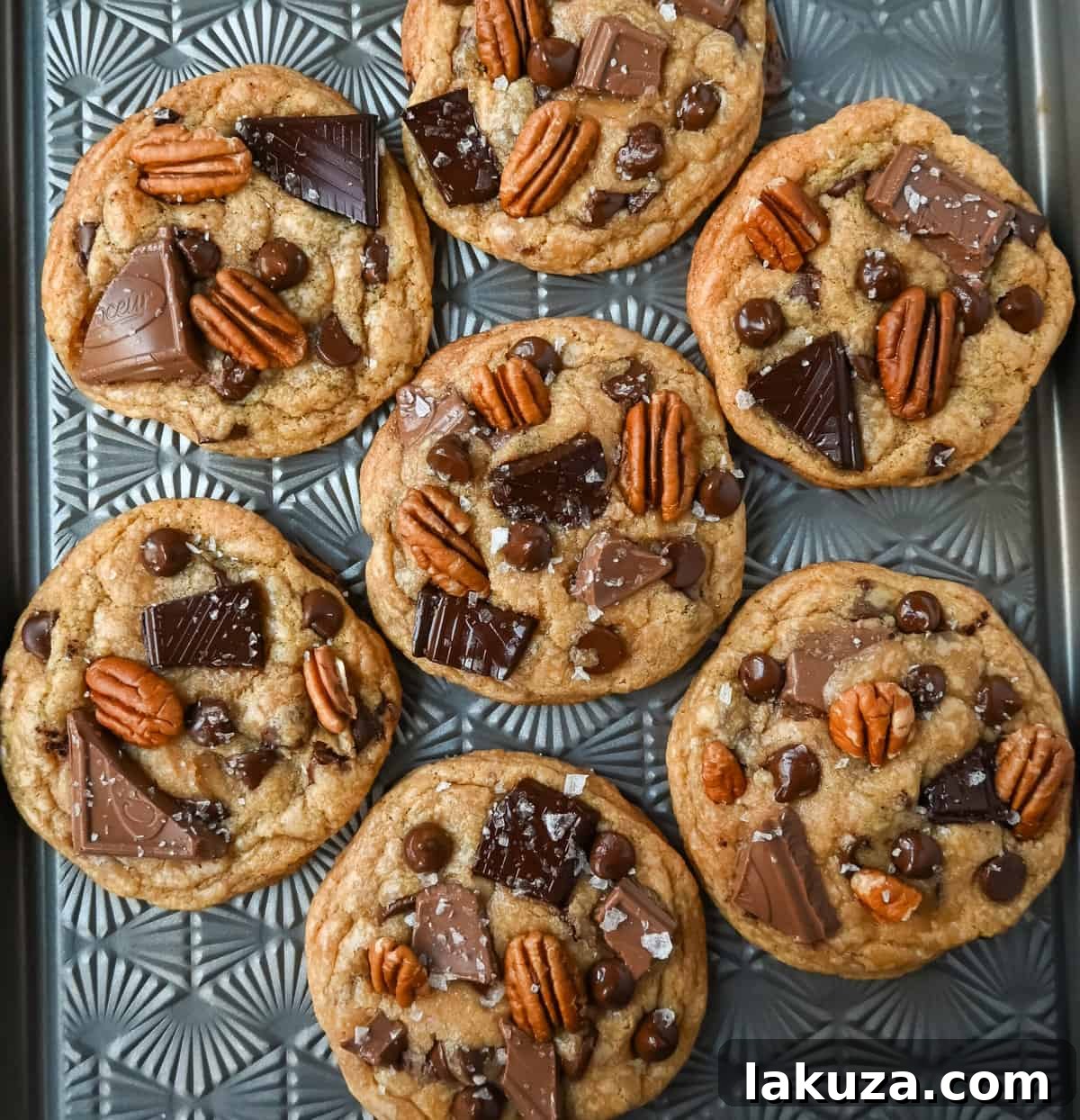 Golden Brown Butter Pecan Chocolate Chunk Delights 3 Close-up of perfectly baked Browned Butter Pecan Chocolate Chunk Cookies with melted chocolate and visible pecan pieces.