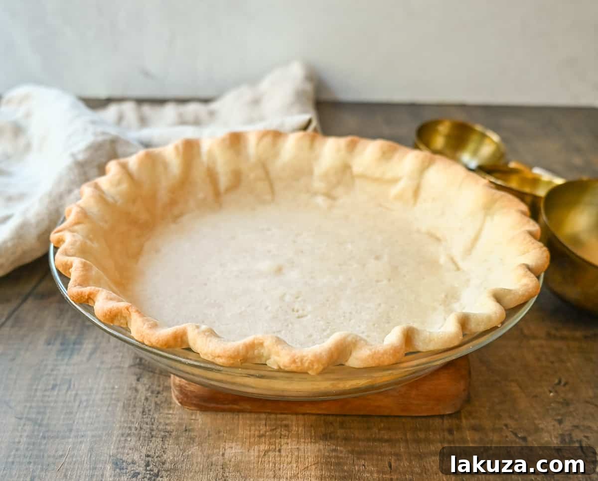 A freshly baked, golden brown all-butter pie crust