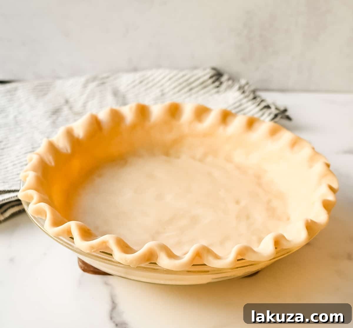 Ingredients for all-butter pie crust: butter, flour, salt, and ice water