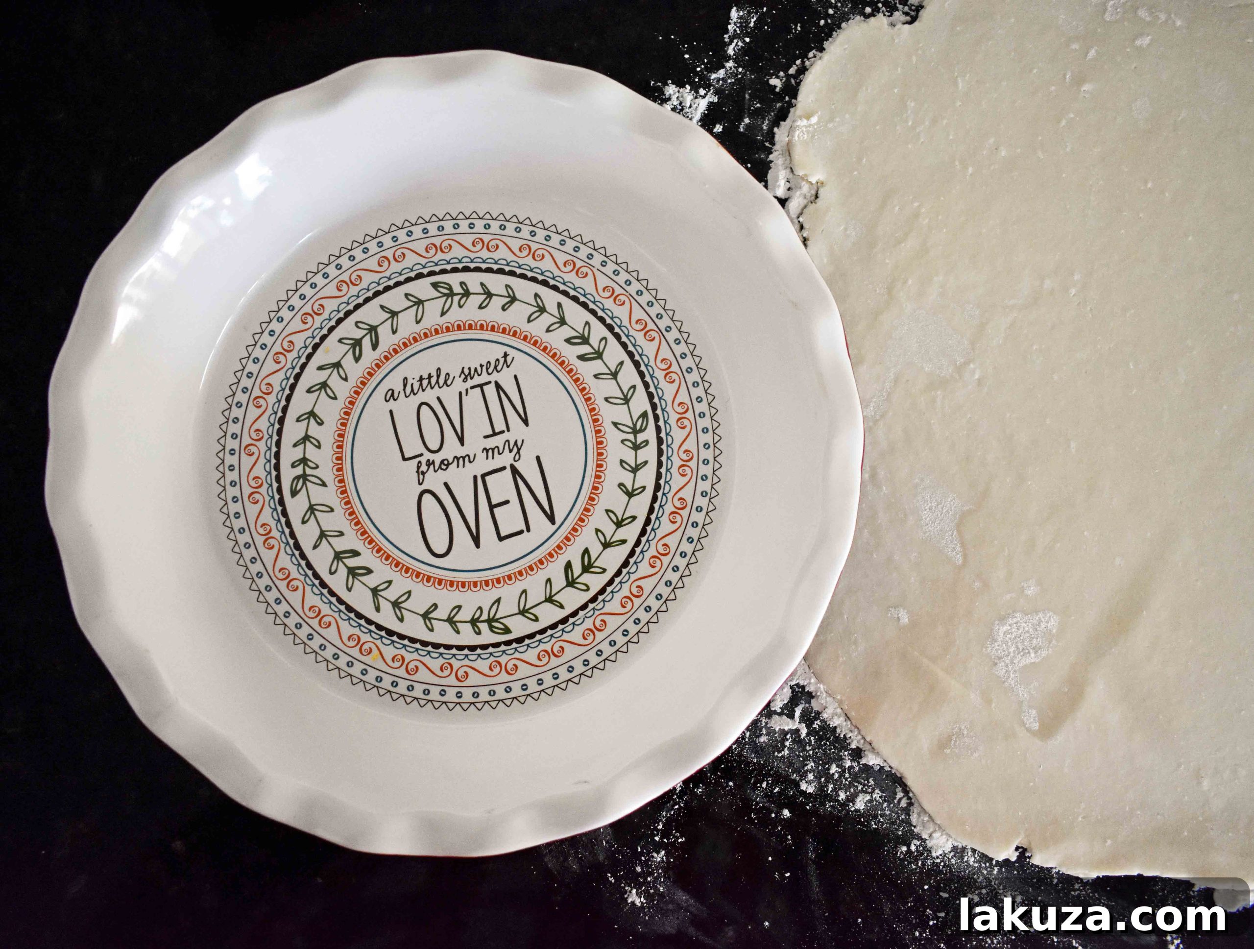 Adding ice-cold water to pie dough mixture in a bowl