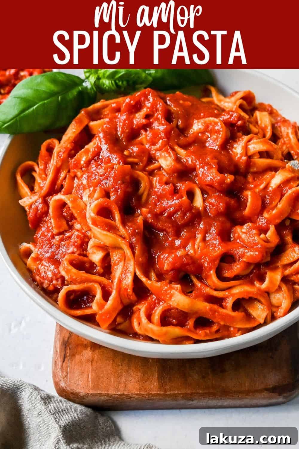 Mi Amor Spicy Pasta. This homemade spicy arrabbiata sauce is made with chopped calabrian chilies for the perfect amount of heat, tossed with fresh pasta and topped with Parmigiano Reggiano cheese and fresh basil. This is the perfect spicy pasta recipe!