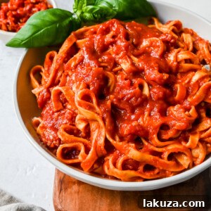 Mi Amor Spicy Pasta. This homemade spicy arrabbiata sauce is made with chopped calabrian chilies for the perfect amount of heat, tossed with fresh pasta and topped with Parmigiano Reggiano cheese and fresh basil. This is the perfect spicy pasta recipe!