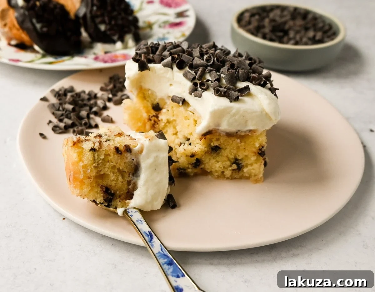 Cannoli Sheet Cake. A light and fluffy yellow chocolate chip cake topped with a sweet ricotta cream topping and mini chocolate chips. All of the flavor of a cannoli in a delicious cake.
