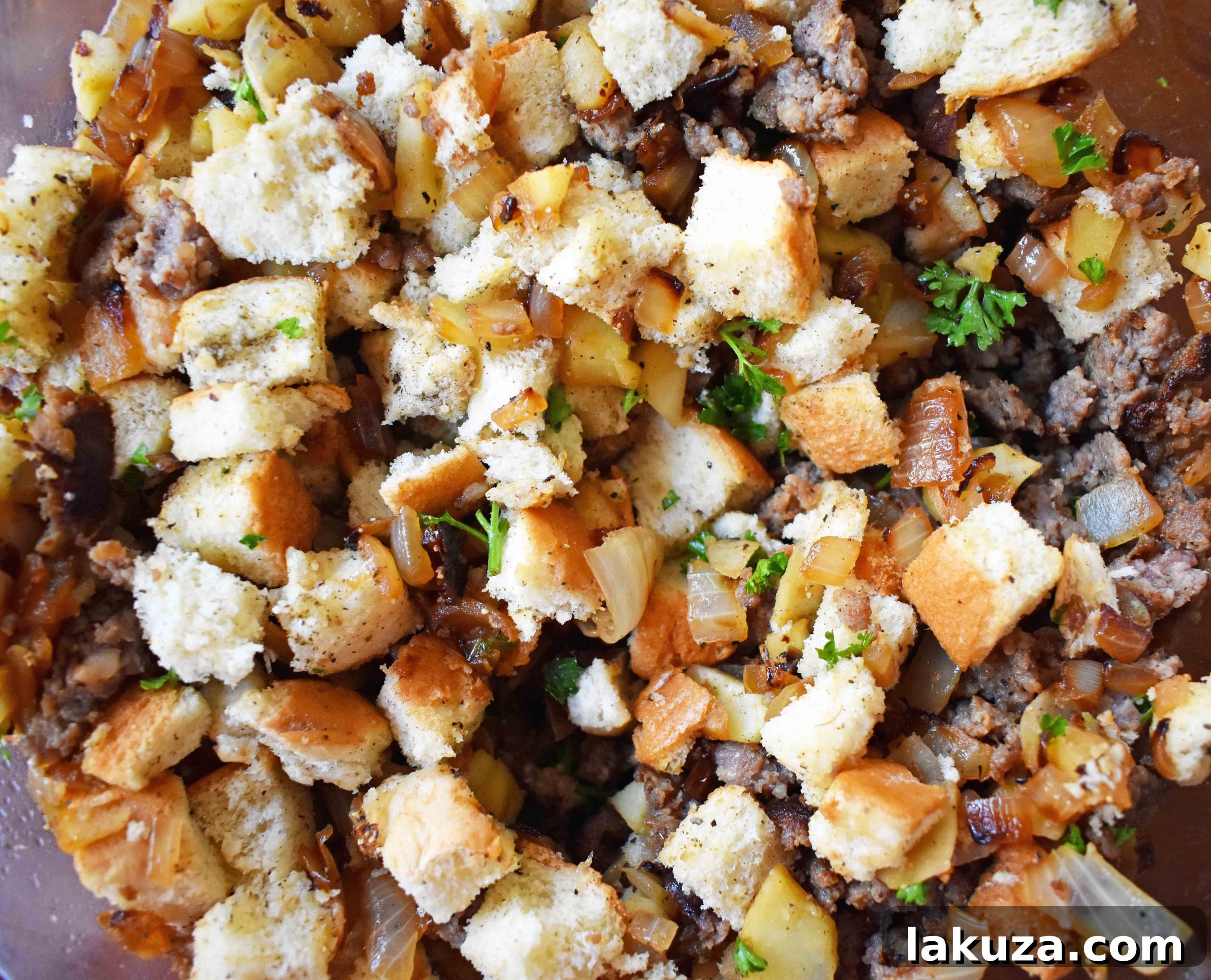 Image demonstrating how to cut bread into cubes for stuffing, showing large, uniform pieces.