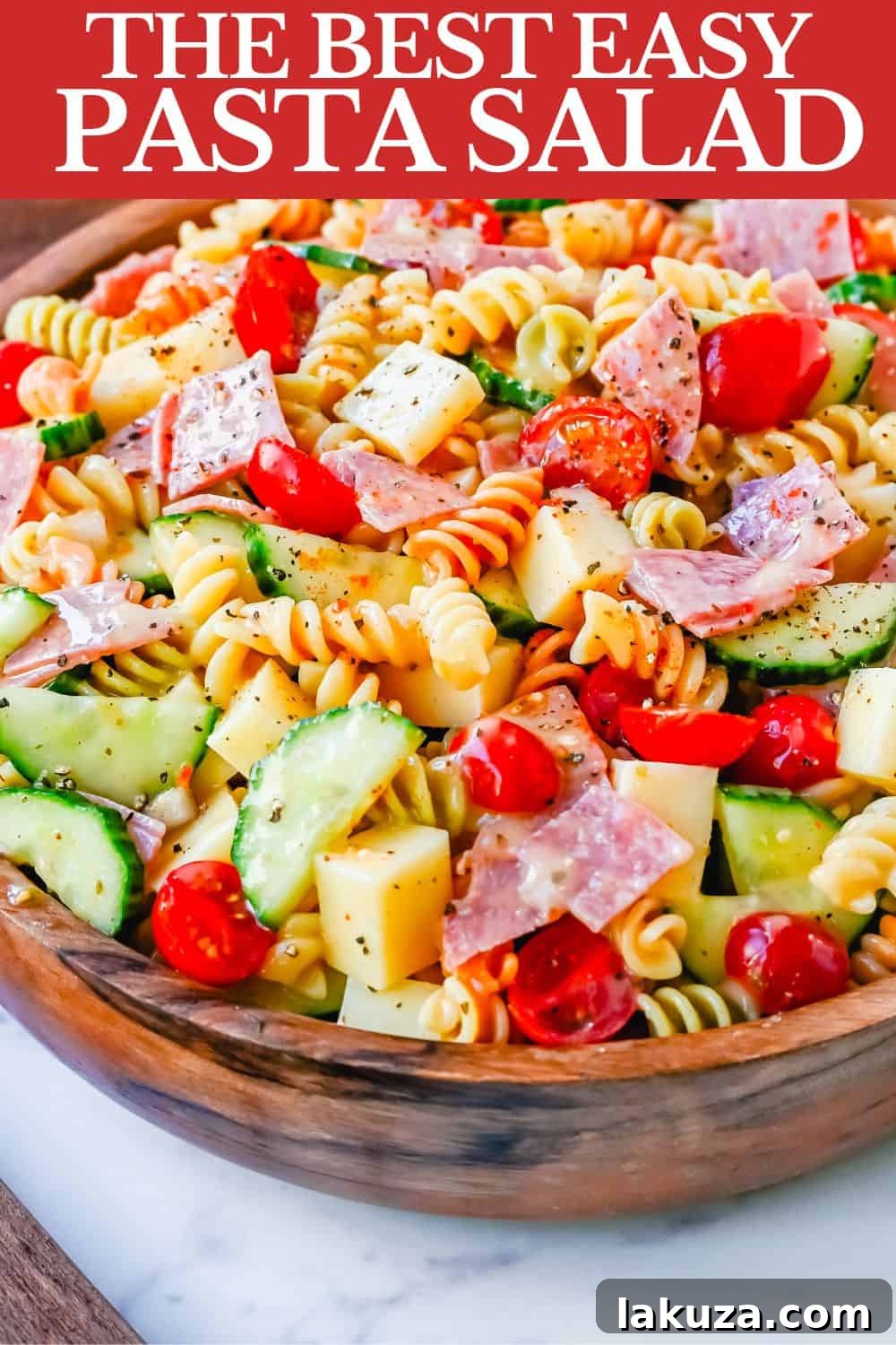 Easy Pasta Salad. This Quick and Easy Pasta Salad Recipe is made with pasta, fresh vegetables, cheese, salami, all tossed with a secret ingredient and Olive Garden Italian dressing. It is the best pasta salad recipe and the most flavorful side dish.
