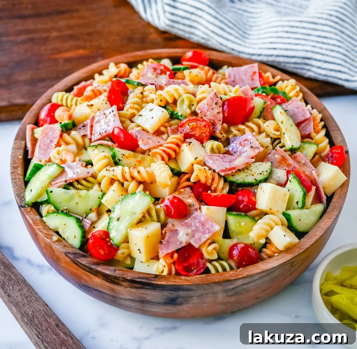 A close-up shot of the finished Easy Pasta Salad, showcasing the perfect blend of ingredients and the appetizing appeal of this versatile side dish.