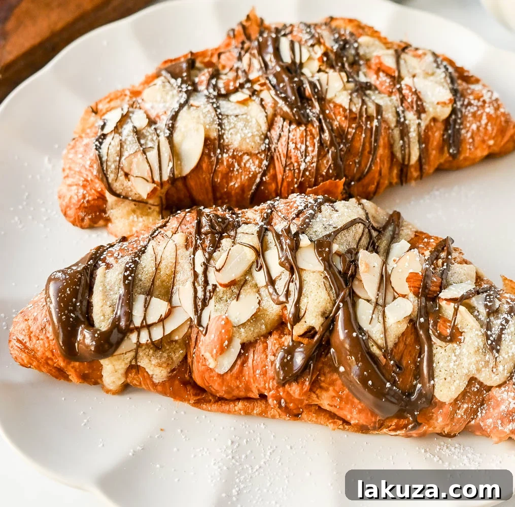 Irresistible Chocolate Almond Croissants 4 Croissants sliced open, ready for almond filling and chocolate.