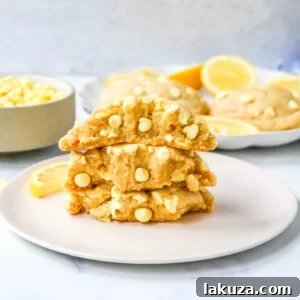 Levain Bakery Lemon Cookies. These soft, thick, chewy, bakery-style Levain Bakery Lemon Cookies are made with three types of lemon flavoring plus lemon chips. You will love these bakery style lemon cookies!