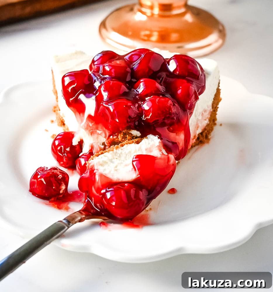 Effortless Cheesecake Delights 2 Decadent No Bake Cheesecake with a perfect slice removed.