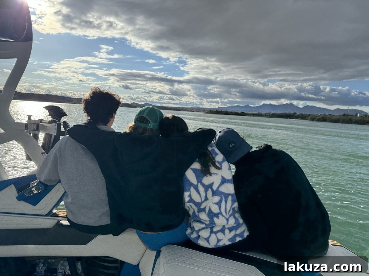 Family bundled up in hoodies and blankets during a cool Spring Break trip to Lake Havasu.
