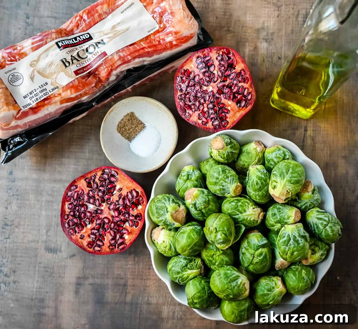 Smoky Bacon and Caramelized Brussels Sprouts 4 Close-up of fresh Brussels sprouts, olive oil, salt, pepper, bacon, maple syrup, and pomegranates – key ingredients for roasting.