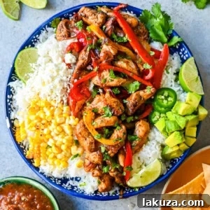 Sizzling Chicken Fajita Bowl 7 Chicken Fajita Bowl. Juicy, flavorful chicken fajitas in a bowl with rice, beans, charred corn, guacamole, salsa, and fresh cilantro. The flavors of chicken fajitas without the tortillas!