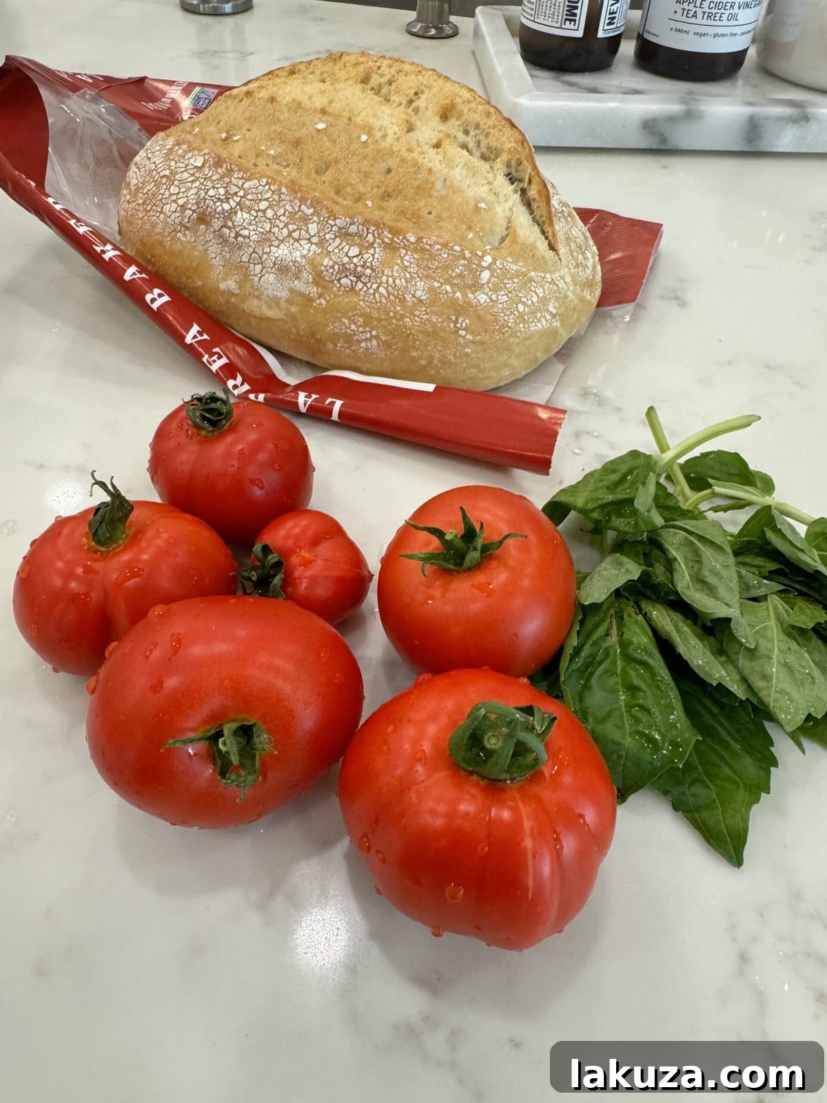 Freshly picked garden tomatoes, vibrant red and ready for use, symbolizing the bounty of summer.
