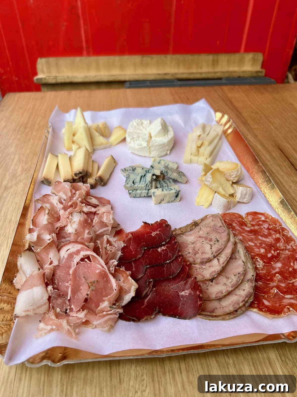 TGIF Gabfest 10 Delicious charcuterie board featuring a selection of French cheeses and cured meats