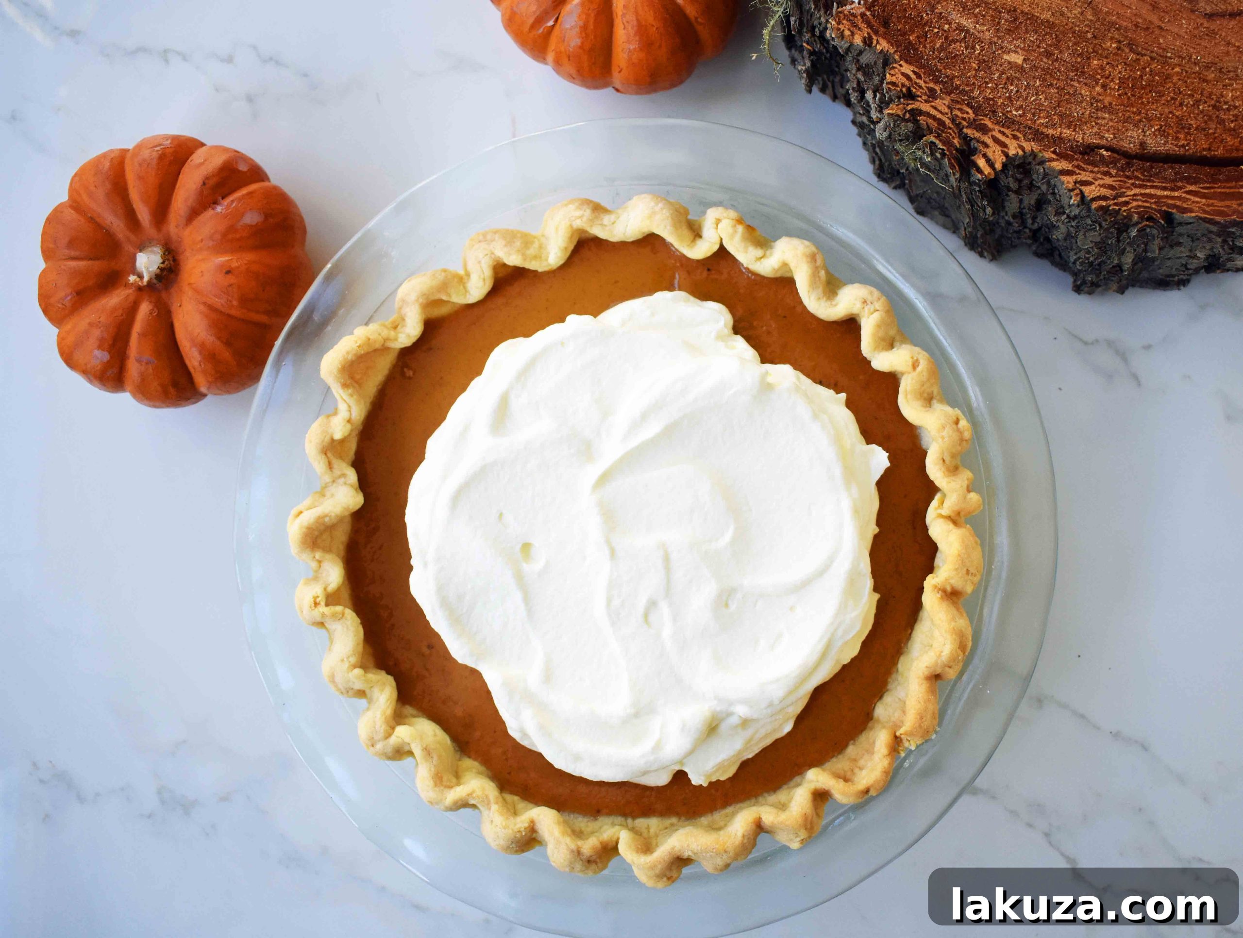Heavenly Pumpkin Pie 5 A beautifully baked pumpkin pie, with a perfectly crimped crust, ready for the holidays.