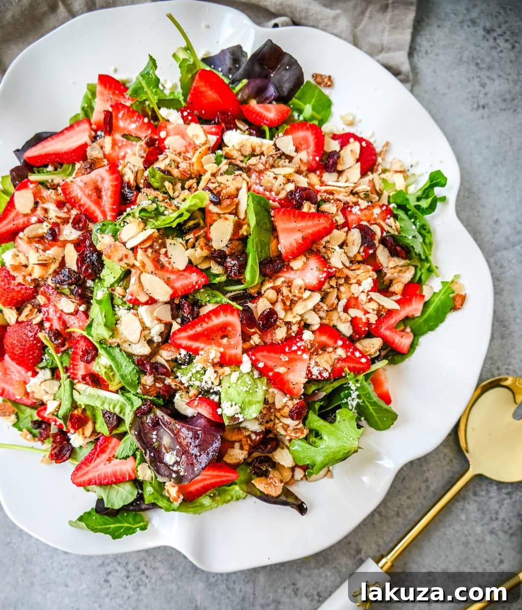 Refreshing Strawberry Spring Mix Salad 3 Strawberry Spring Mix Salad. This Strawberry Poppyseed Salad is made with spring mix, fresh strawberries, creamy and tangy feta cheese, sugared almonds, and tossed with a sweet homemade poppyseed dressing.