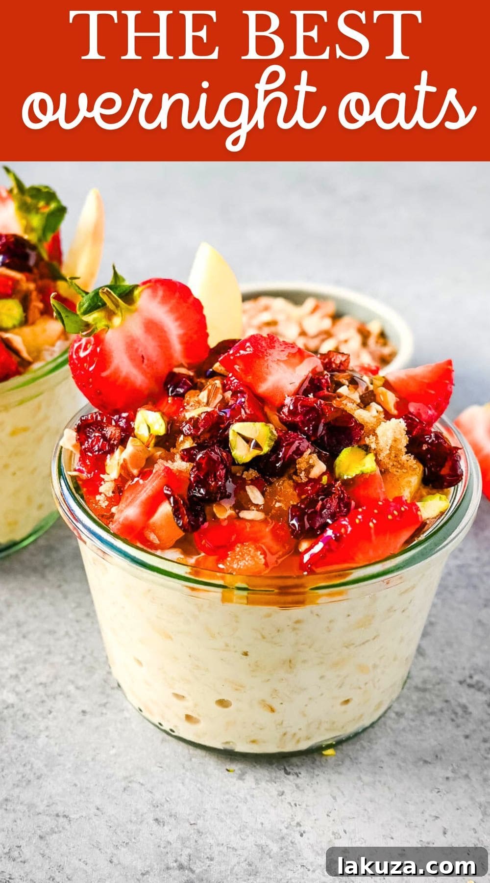 Dreamy Overnight Oats 8 A large jar of Bircher Muesli Overnight Oats with layers of fresh fruit and cream, showcasing the texture and toppings.