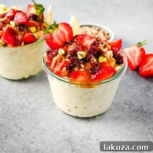 This overnight oats recipe also called Bircher Muesli is made by soaking oats overnight with juice, milk, honey, vanilla, and greek yogurt and then fold in vanilla whipped cream for extra creaminess and topped with fresh fruits, dried fruits, and nuts. It is the perfect and delicious easy, grab-and-go breakfast.