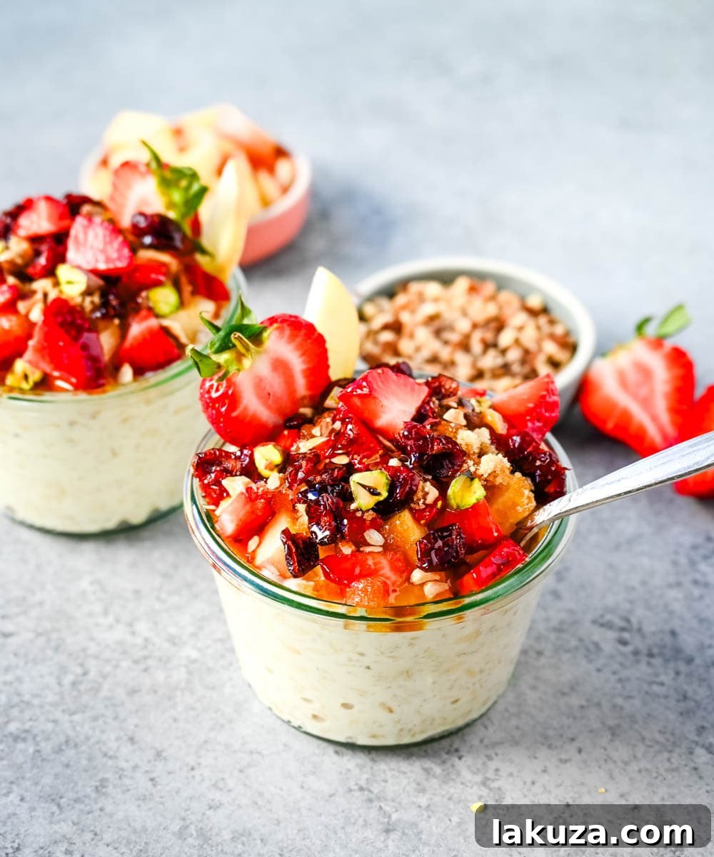Dreamy Overnight Oats 3 Close-up of creamy Bircher Muesli Overnight Oats with fresh berries and orange slices, ready for a healthy morning.