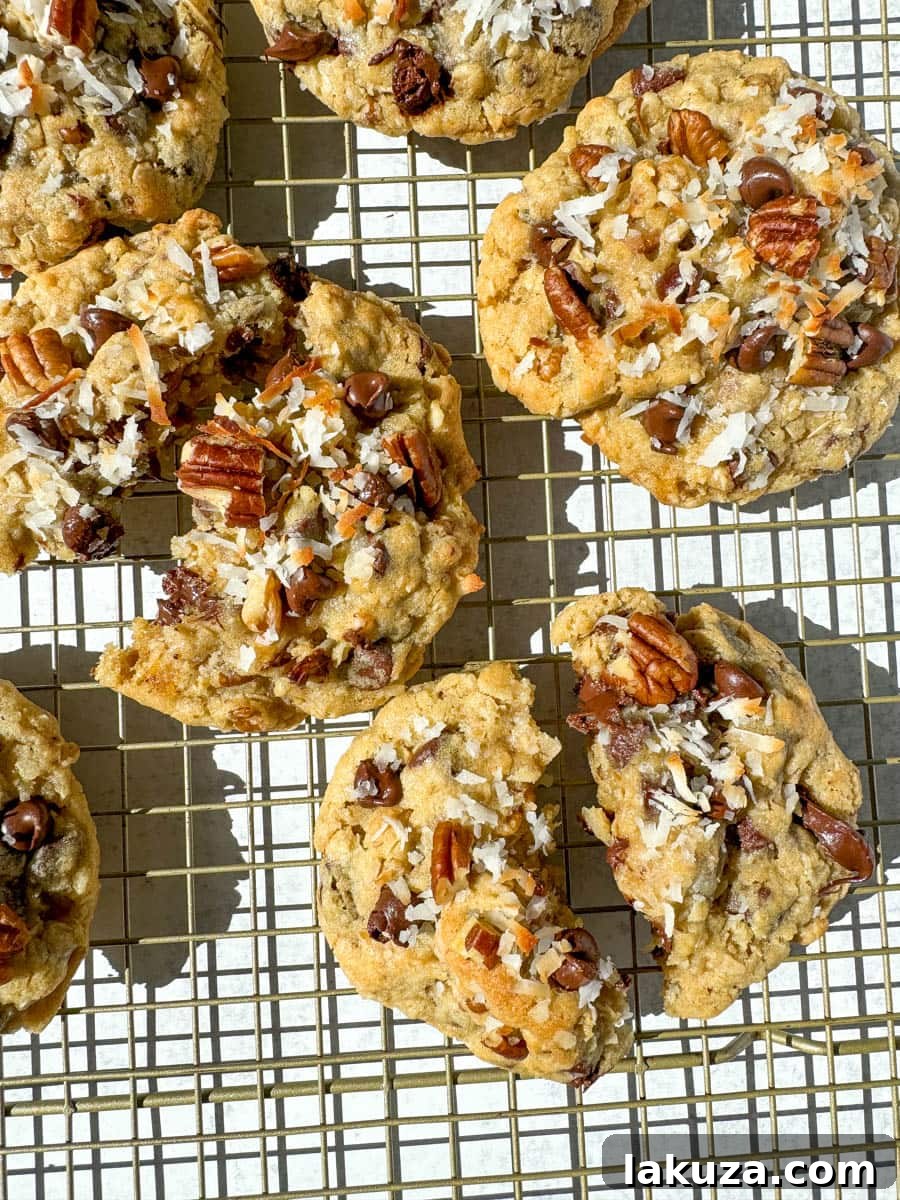 A stack of golden brown Cowboy Cookies, ready to be enjoyed.