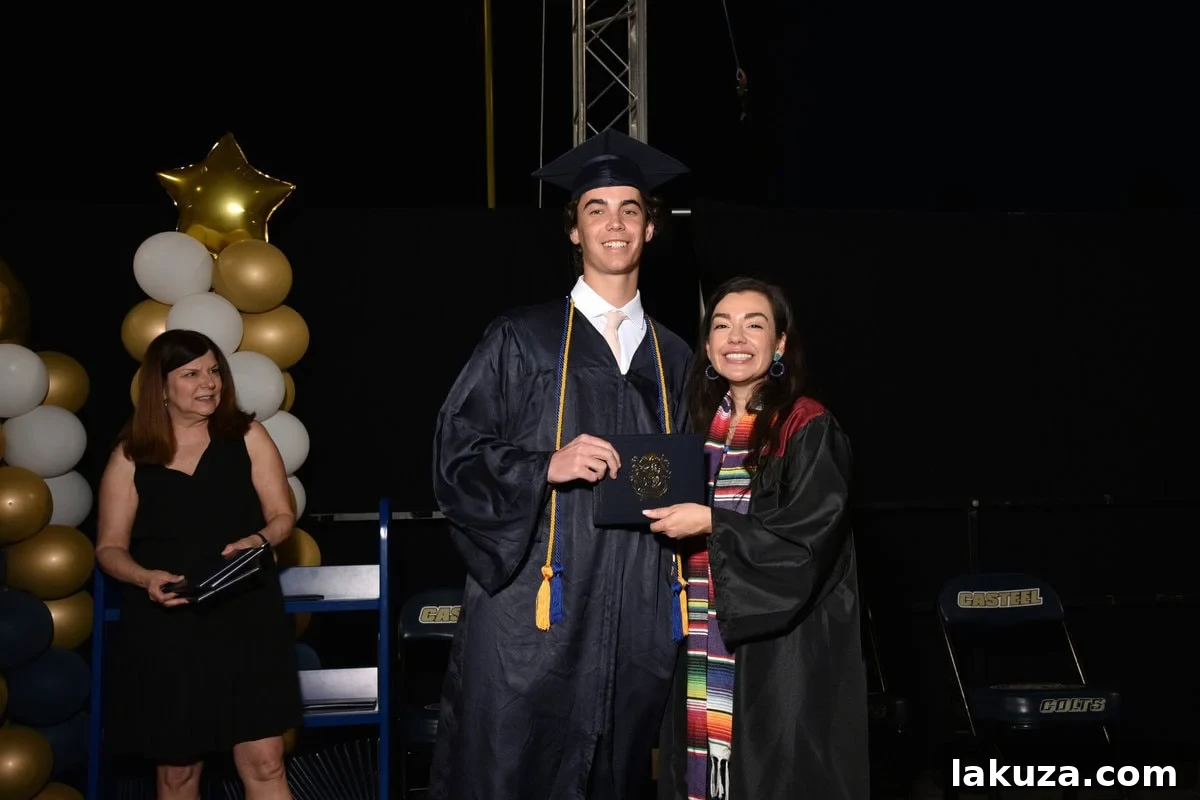 Carson, our son, smiling proudly in his graduation cap and gown