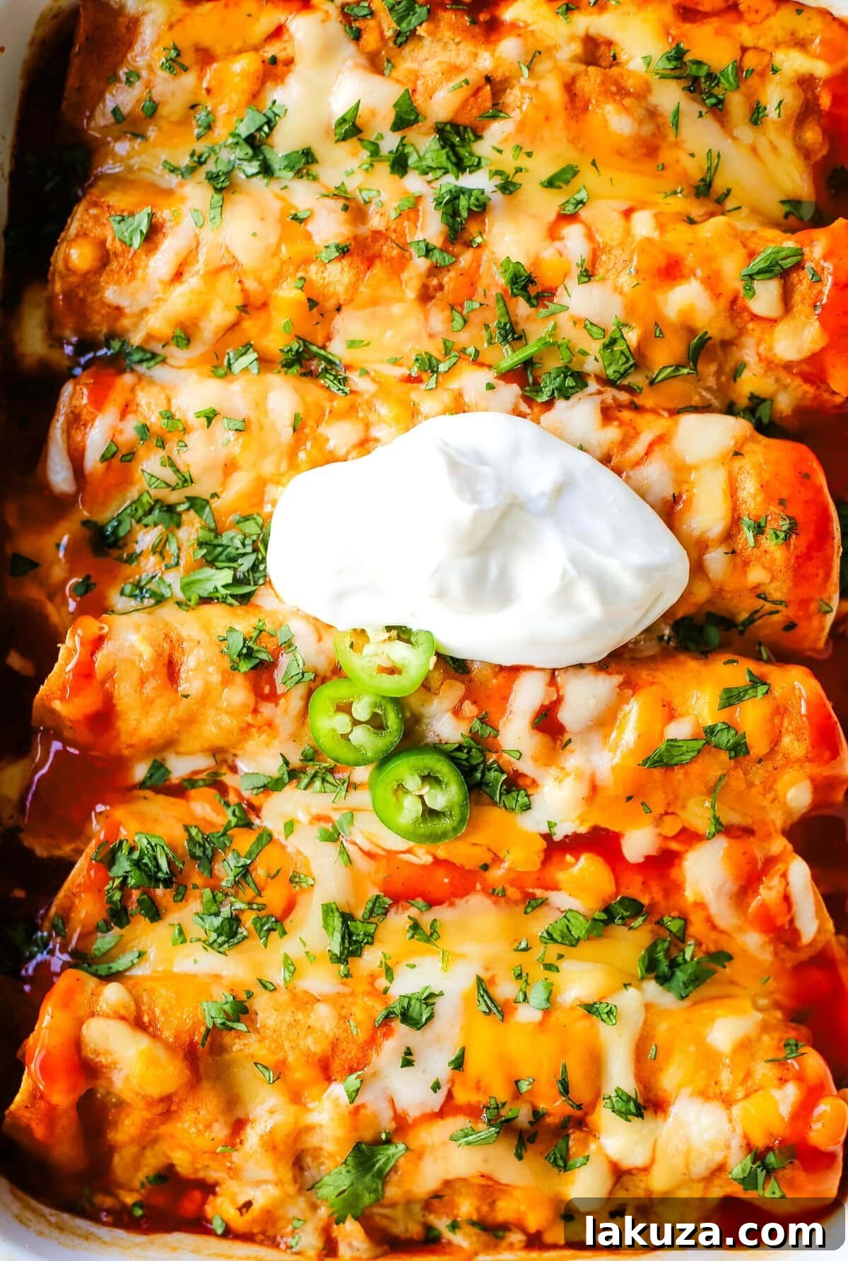 Simple Weeknight Chicken Enchiladas 4 Close-up of the easy chicken enchiladas ready for baking.