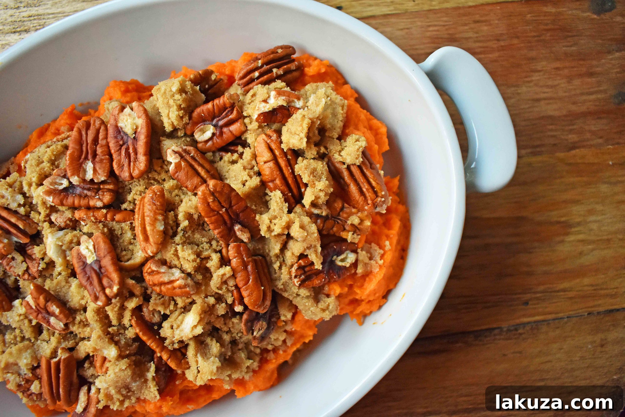 Golden brown Sweet Potato Brown Sugar Pecan Bake, a festive and comforting side dish perfect for any holiday meal.