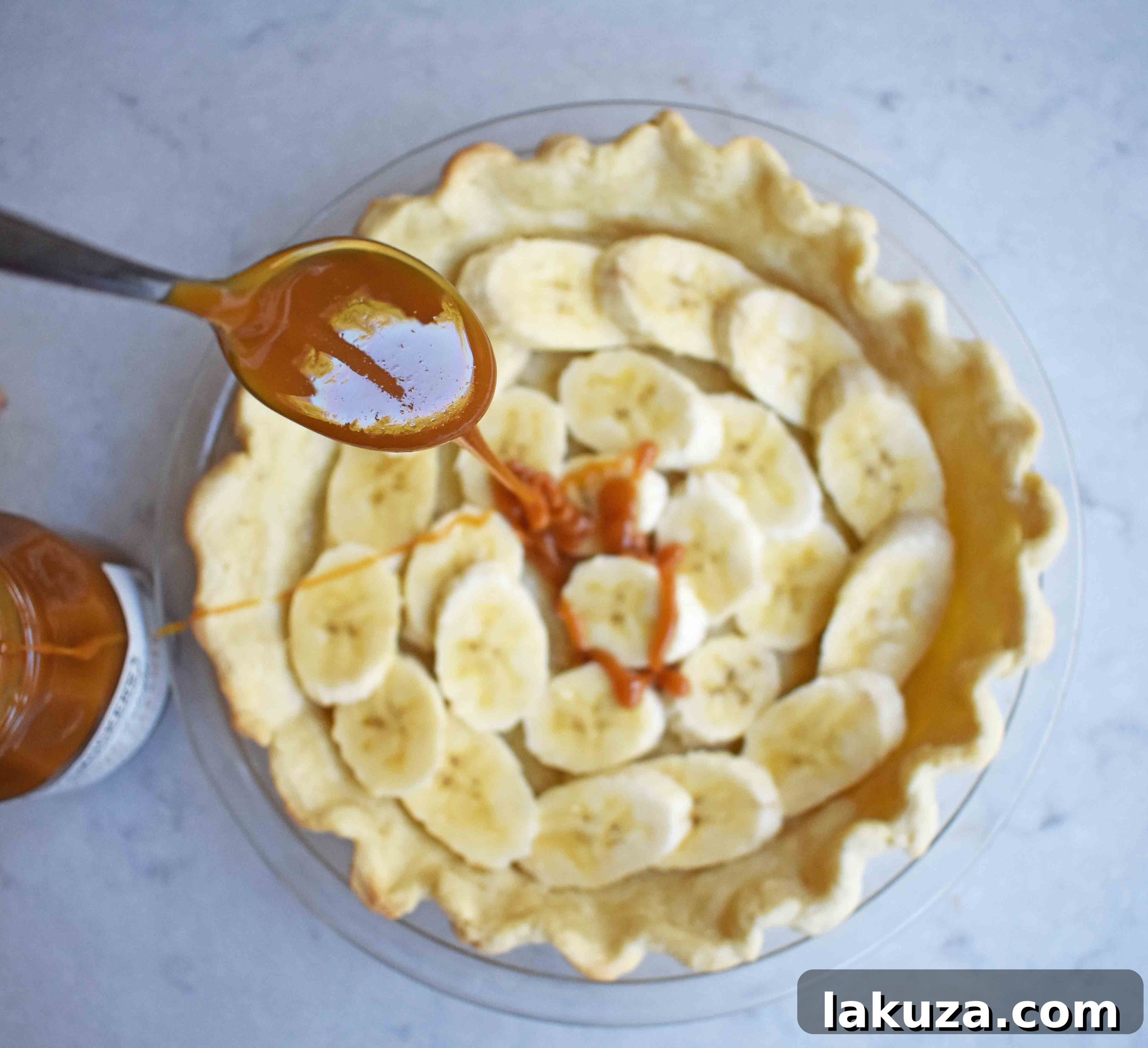 Salted Caramel Banana Cream Pie Perfection 5 Salted Caramel Banana Cream Pie. Sweet Homemade Custard topped with fresh bananas, handcrafted salted caramel, and sweetened whipped cream all on a flaky, buttery crust.