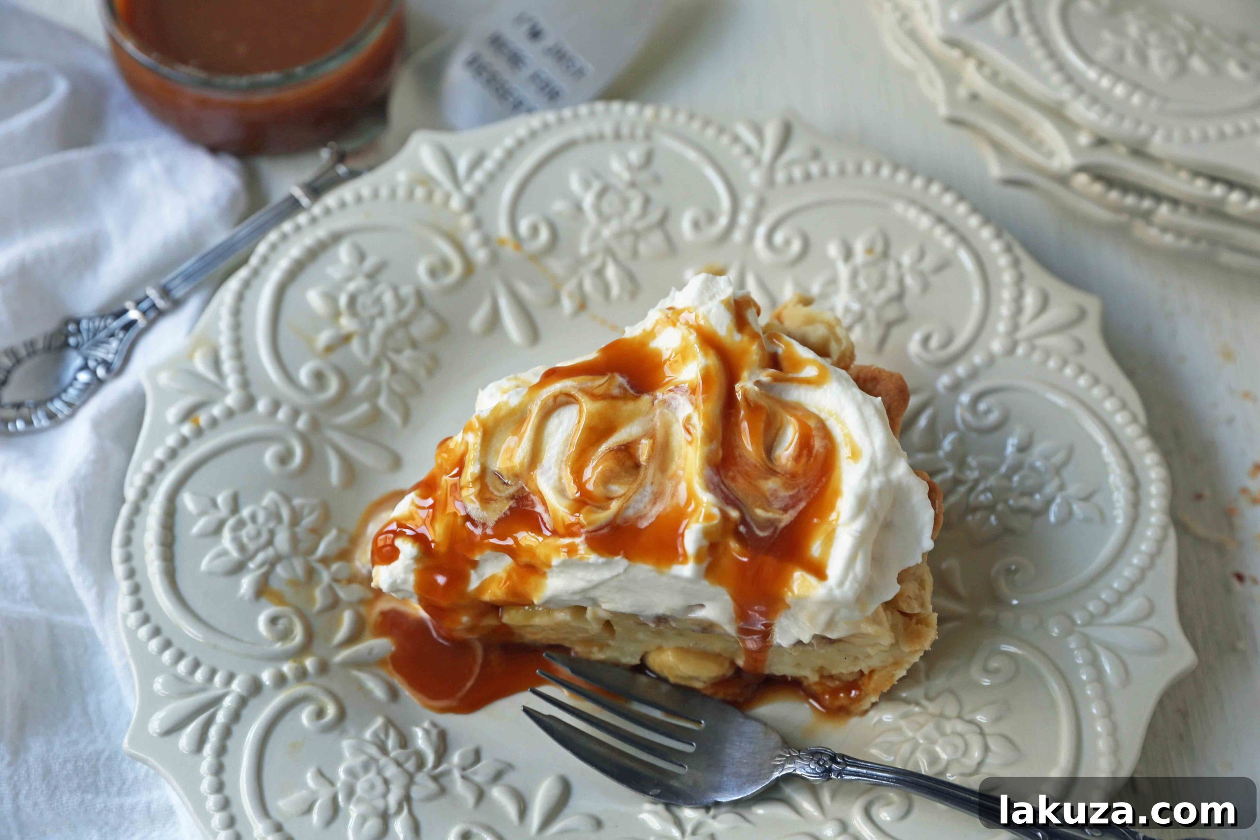 Salted Caramel Banana Cream Pie Perfection 9 Salted Caramel Banana Cream Pie. Homemade banana cream pie with salted caramel. www.modernhoney.com #bananacreampie #caramelbananacreampie #thanksgivingpie #thanksgiving #pie #pierecipes