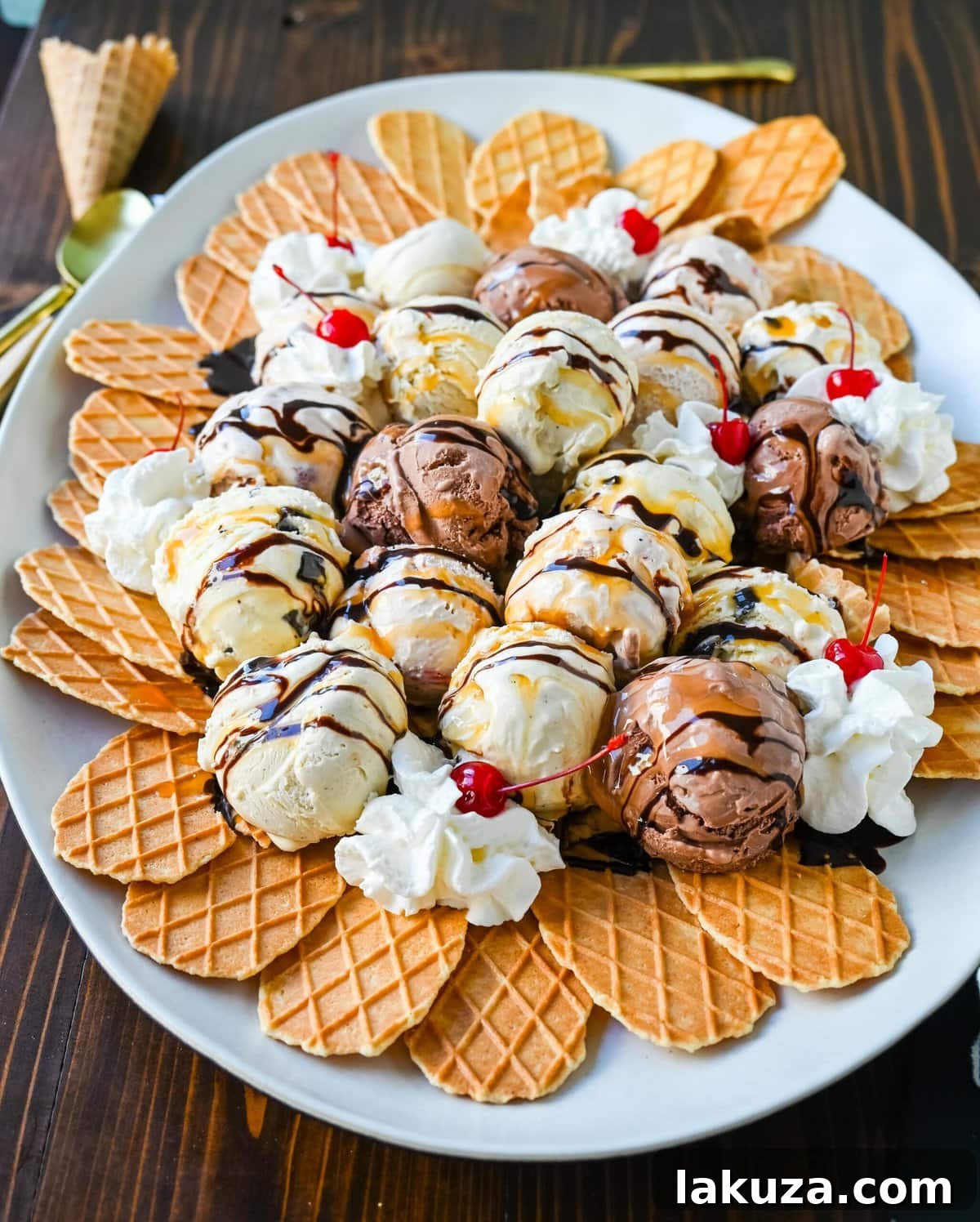 Sweet Chip Sundae 9 A close-up of Ice Cream Nachos with a generous drizzle of melted chocolate and caramel sauce, highlighting the crunchy texture of the waffle cones beneath the creamy ice cream.